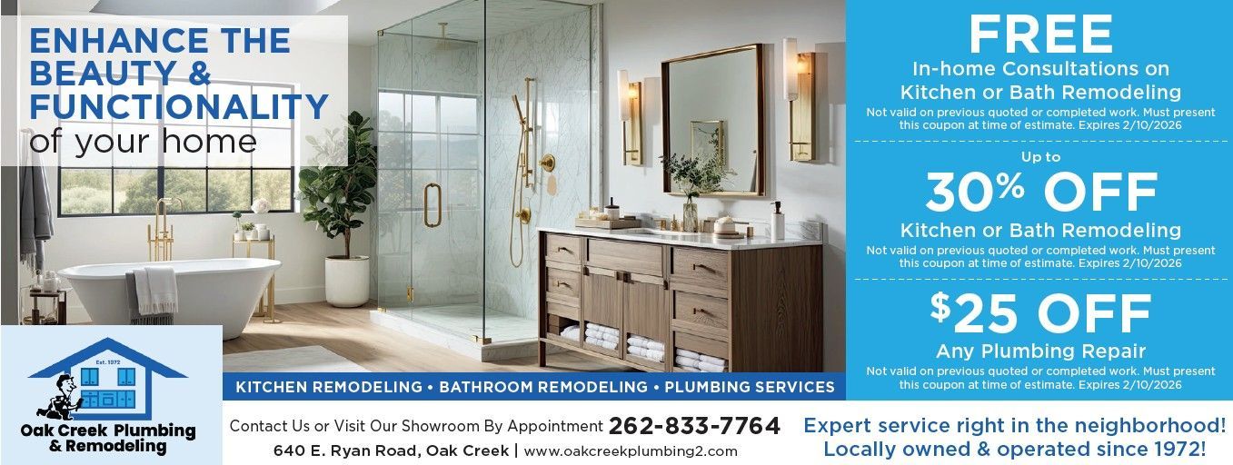 A bathroom with a tub and a window on the wall.