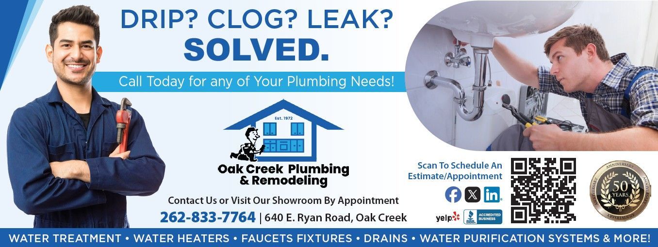 A bathroom with a tub and a window on the wall.