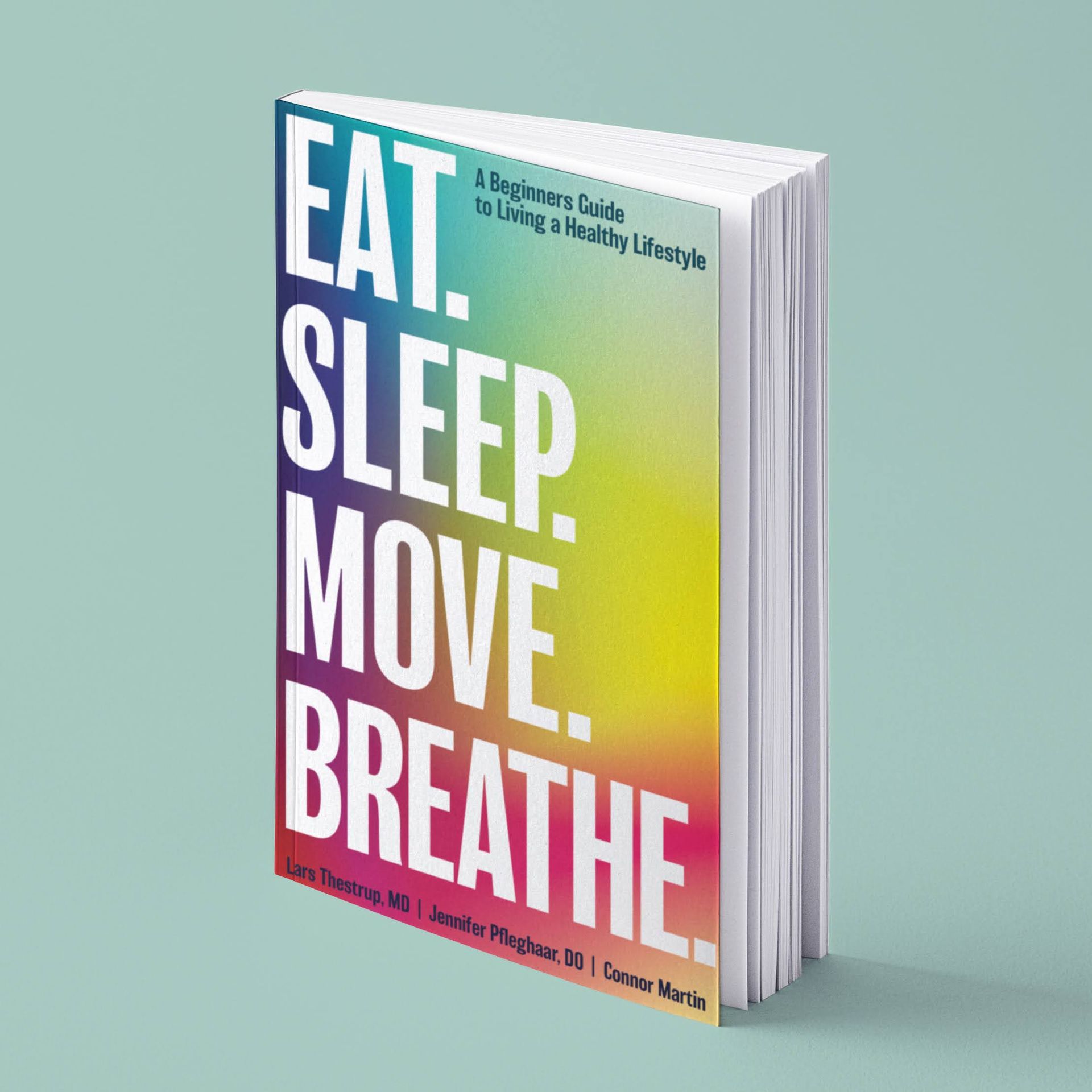 Colorful book cover reading “EAT. SLEEP. MOVE. BREATHE.” on a mint background