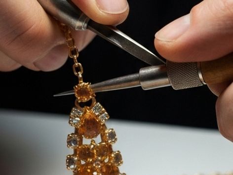 A blurry picture of a shopping mall with people walking through it.