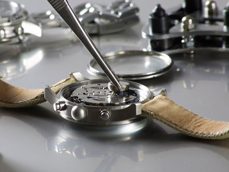 A blurred image of a restaurant with a table in the foreground.