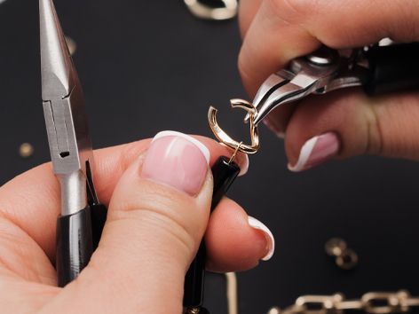 A large empty office with lots of windows and tables and chairs.