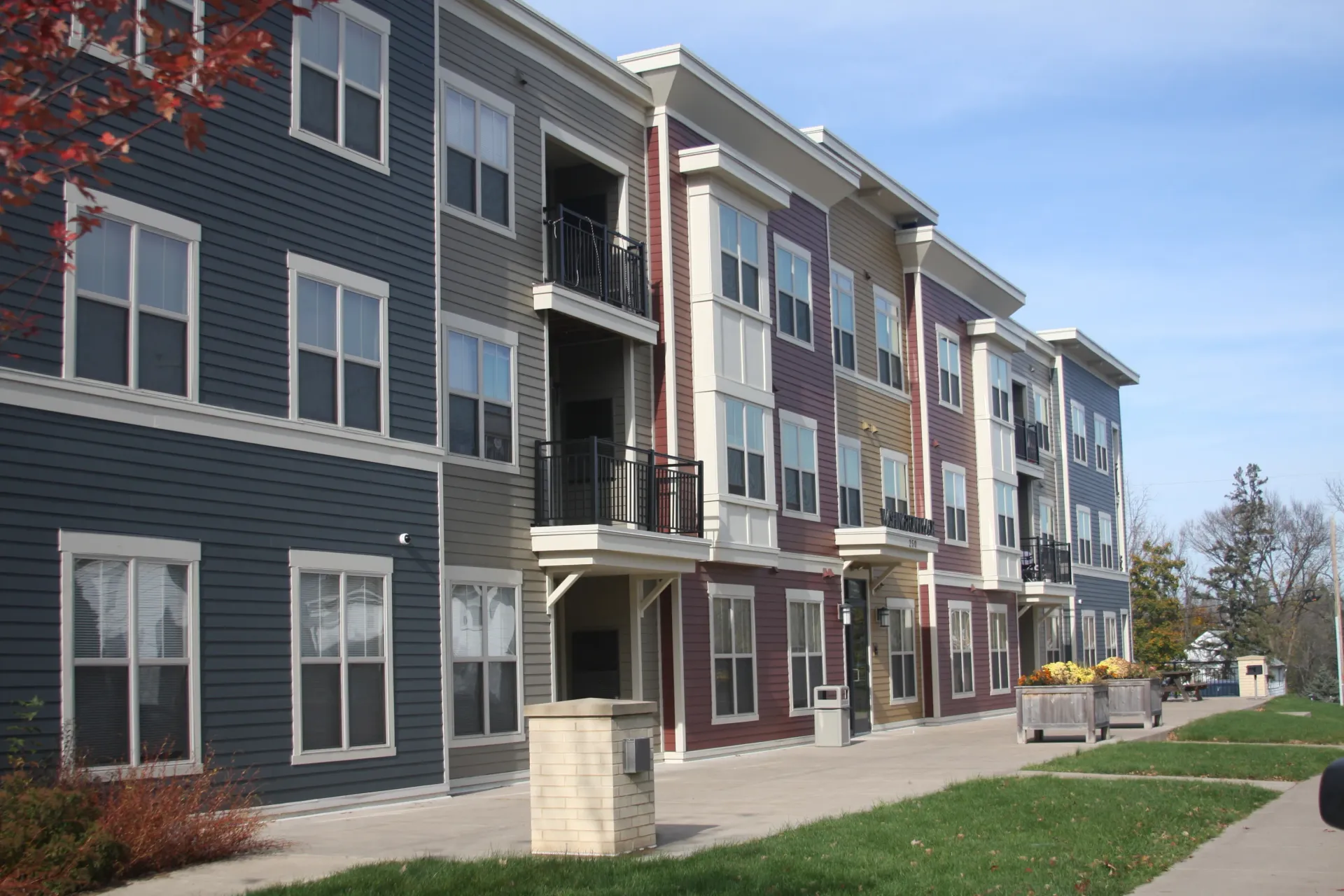 A large apartment building with a lot of windows
