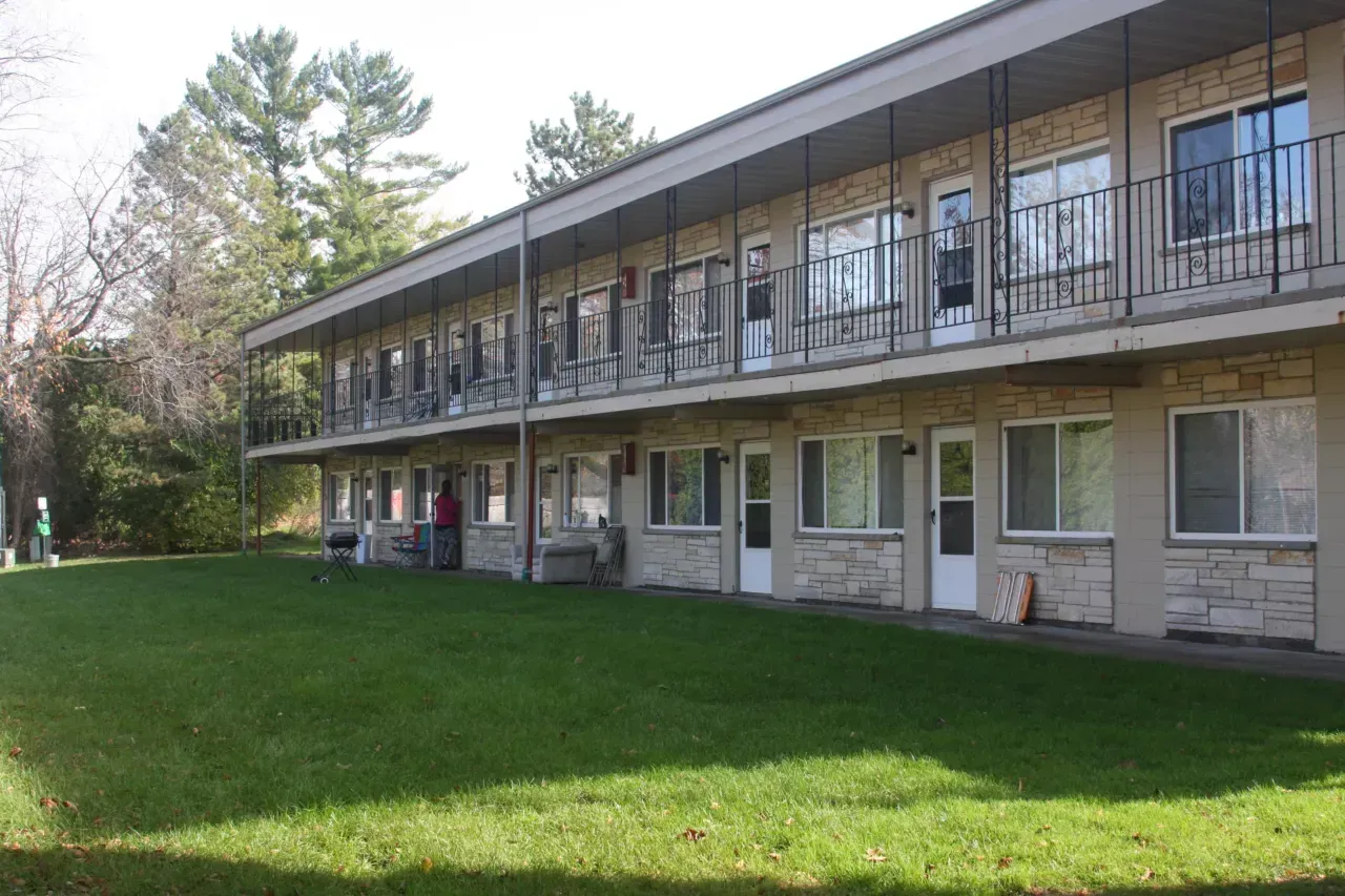 A large building with a lot of windows and balconies