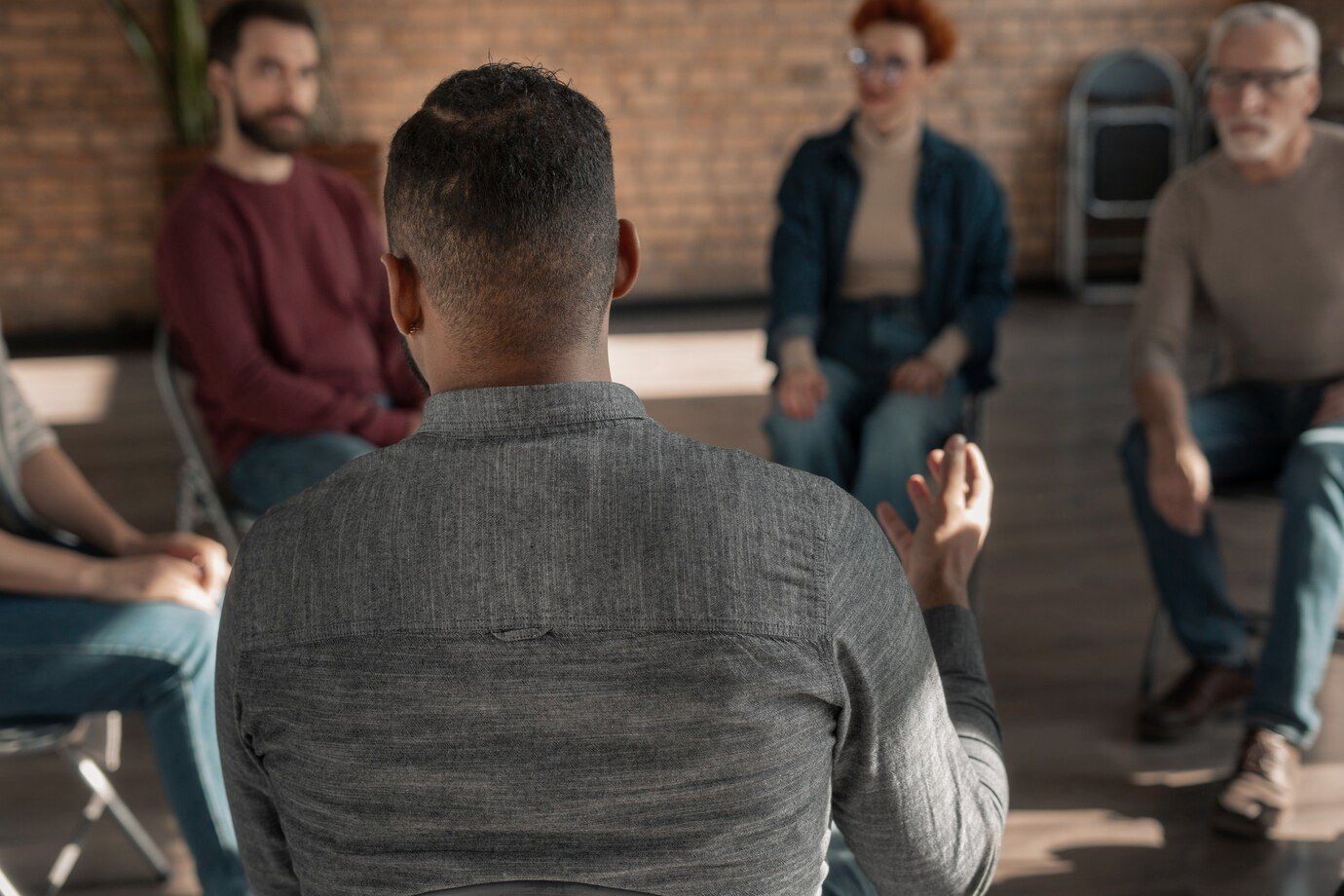 group of people having a meeting for worship rehearsal