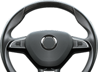 A black automotive steering wheel with a central circular emblem housing and multi-function buttons on the side spokes. | Waggener Brake and Auto Repair