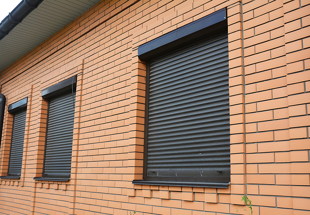 Roller Shutters On Brick Wall
