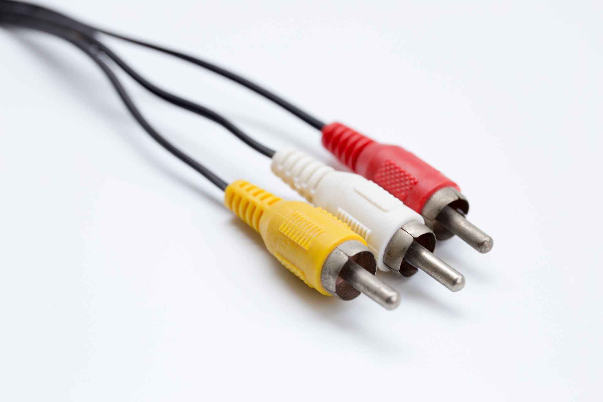 A close up of three rca connectors on a cable.