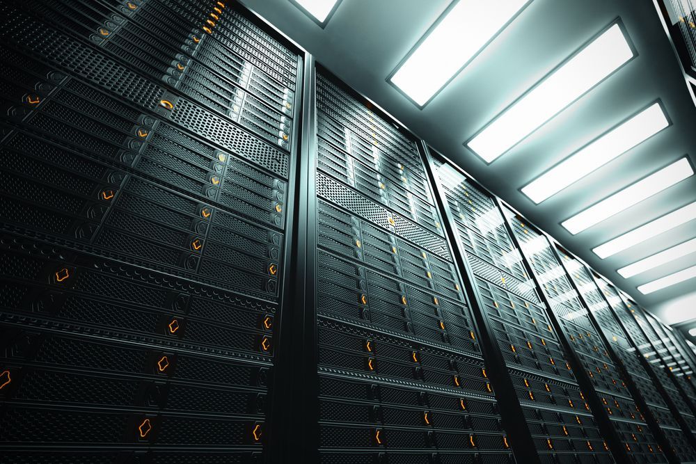 A server room filled with lots of servers and lights.