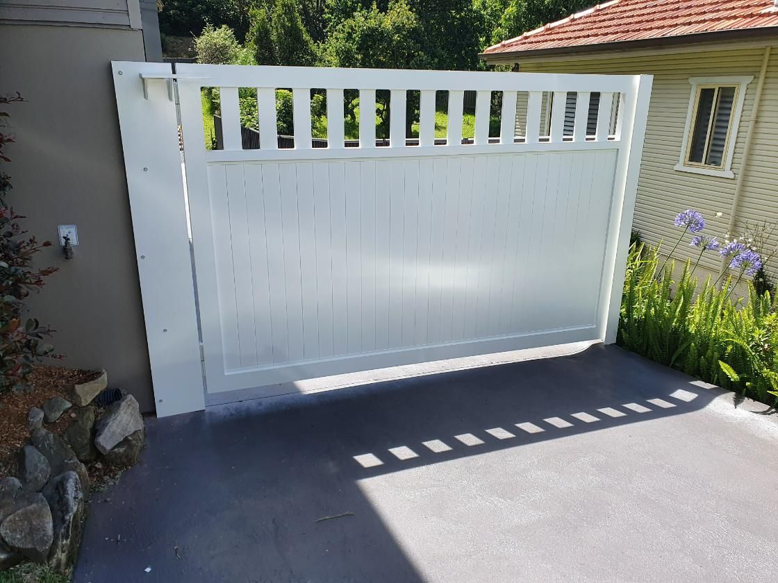 White Closed Gate With a Slatted Top — D & T Balustrade Systems In Unanderra, NSW