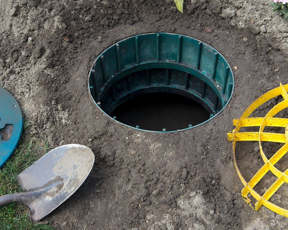 Open Septic Tank Lid with Cover.