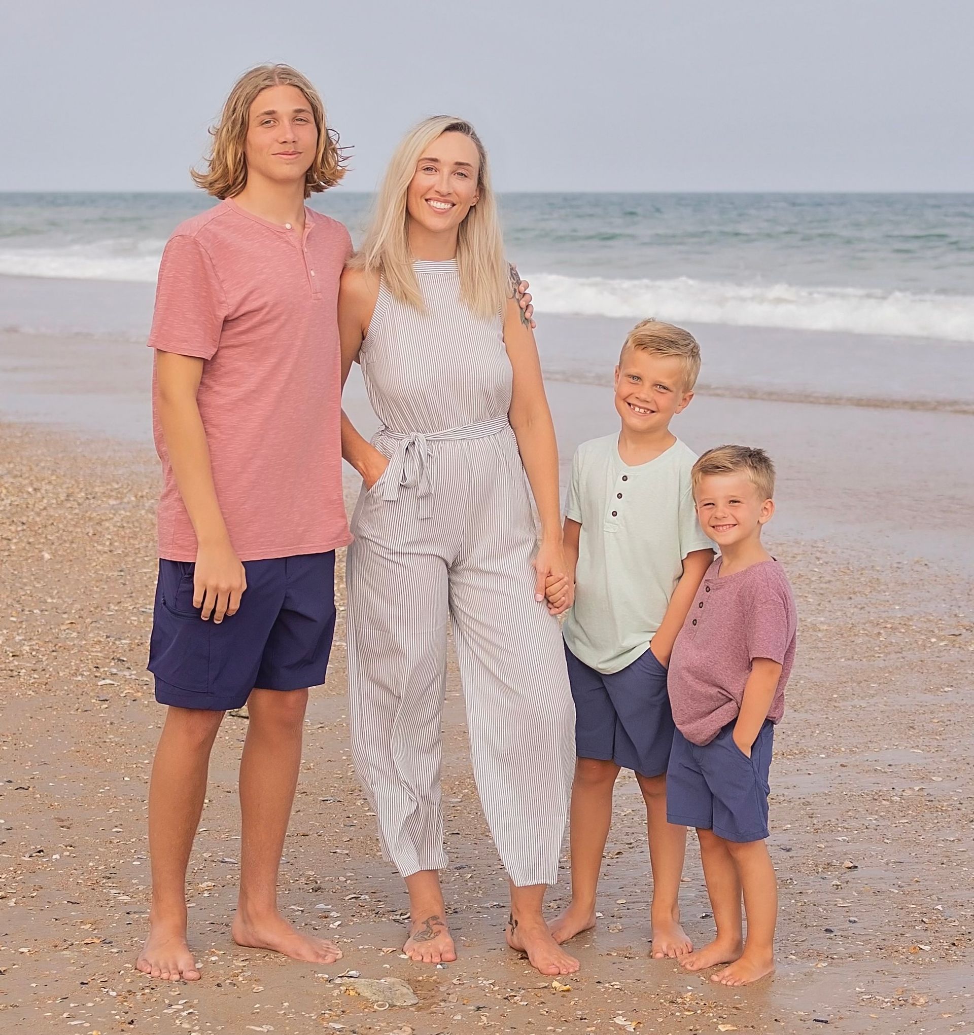 jessica ivey fnp-bc and her 3 children at the beach