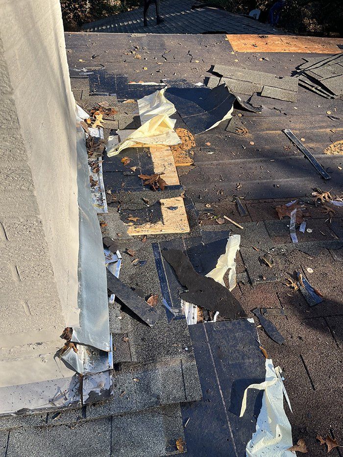 tearing out damaged roof