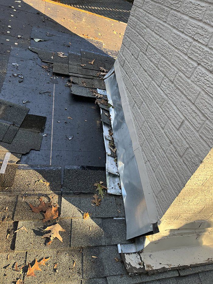 tearing out old shingles