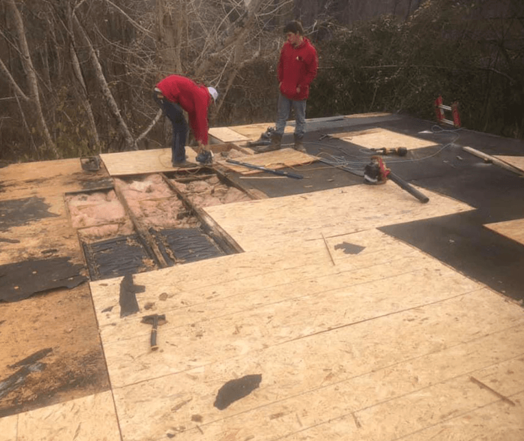 roofing contractors on roof