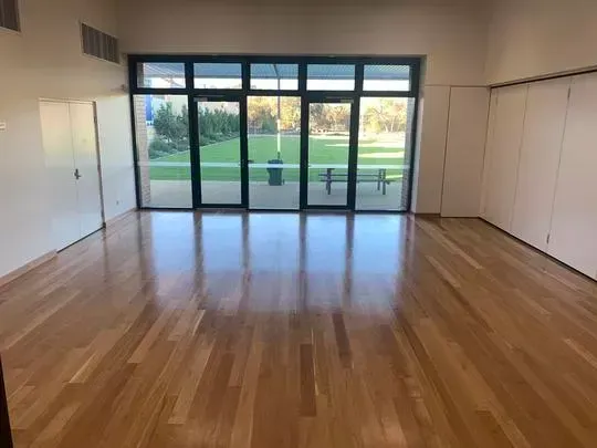 Hall 2 - wooden floor with glass doors