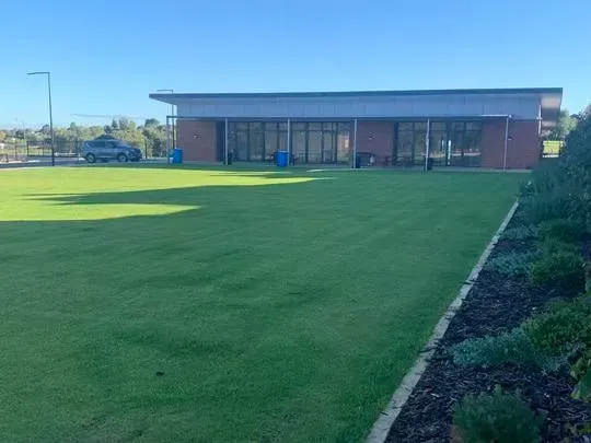 A well-manicured green lawn available to all users