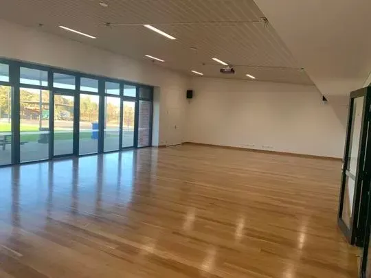 Hall 1 - wooden floor, glass doors, AV System and Projector
