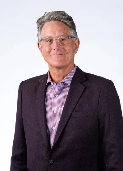 Photo of Dr. Eric Westerman on a light gray background. 