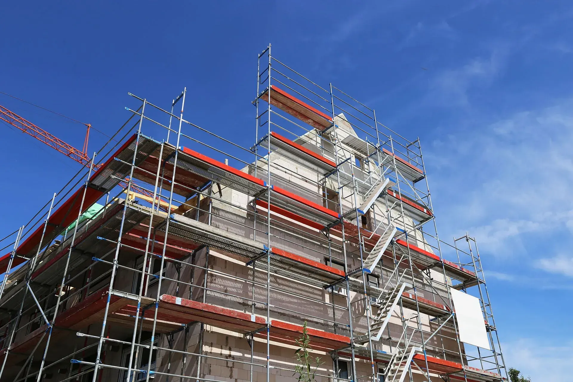 house under construction with scaffolding