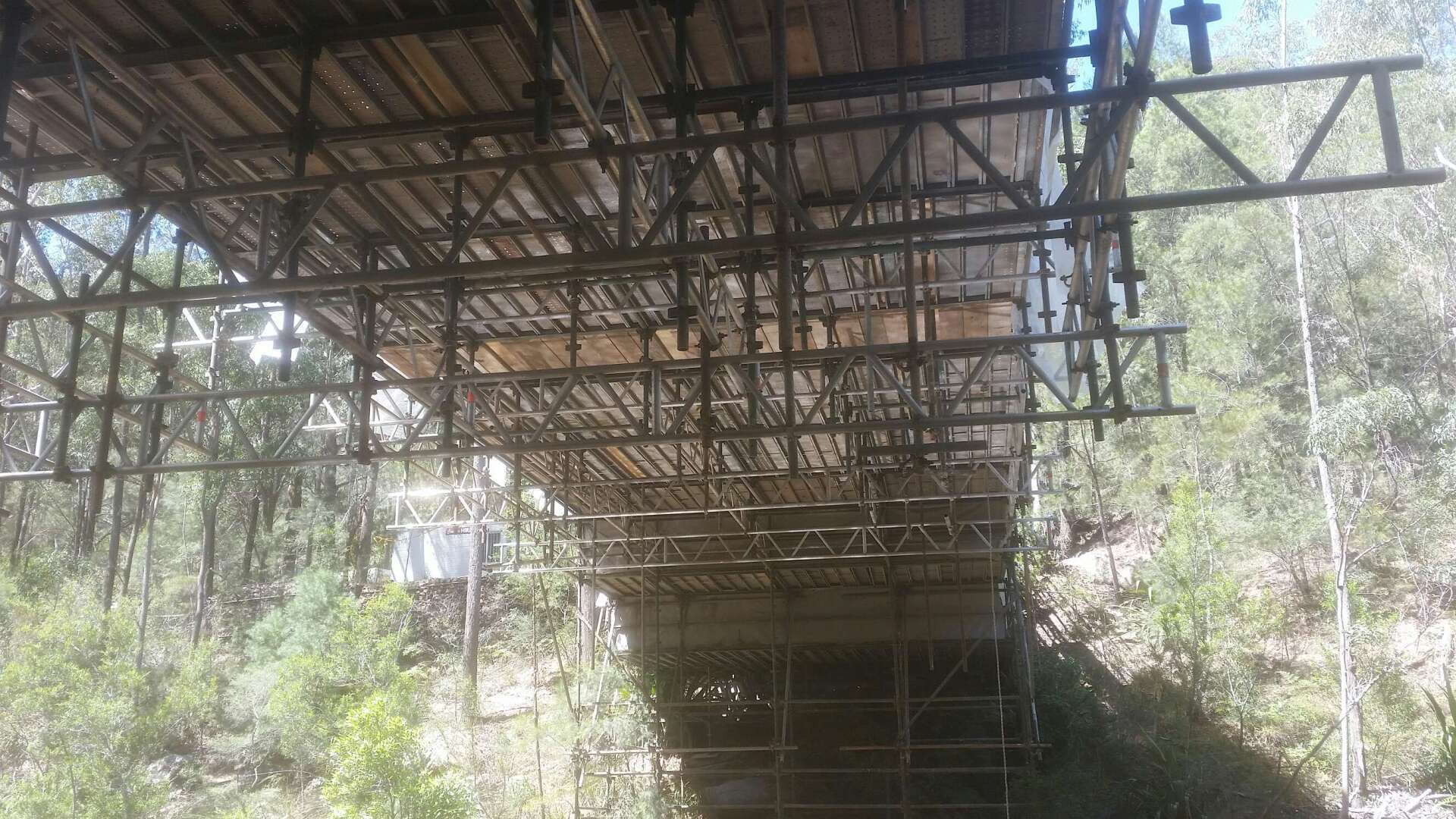 scaffolding under a bridge