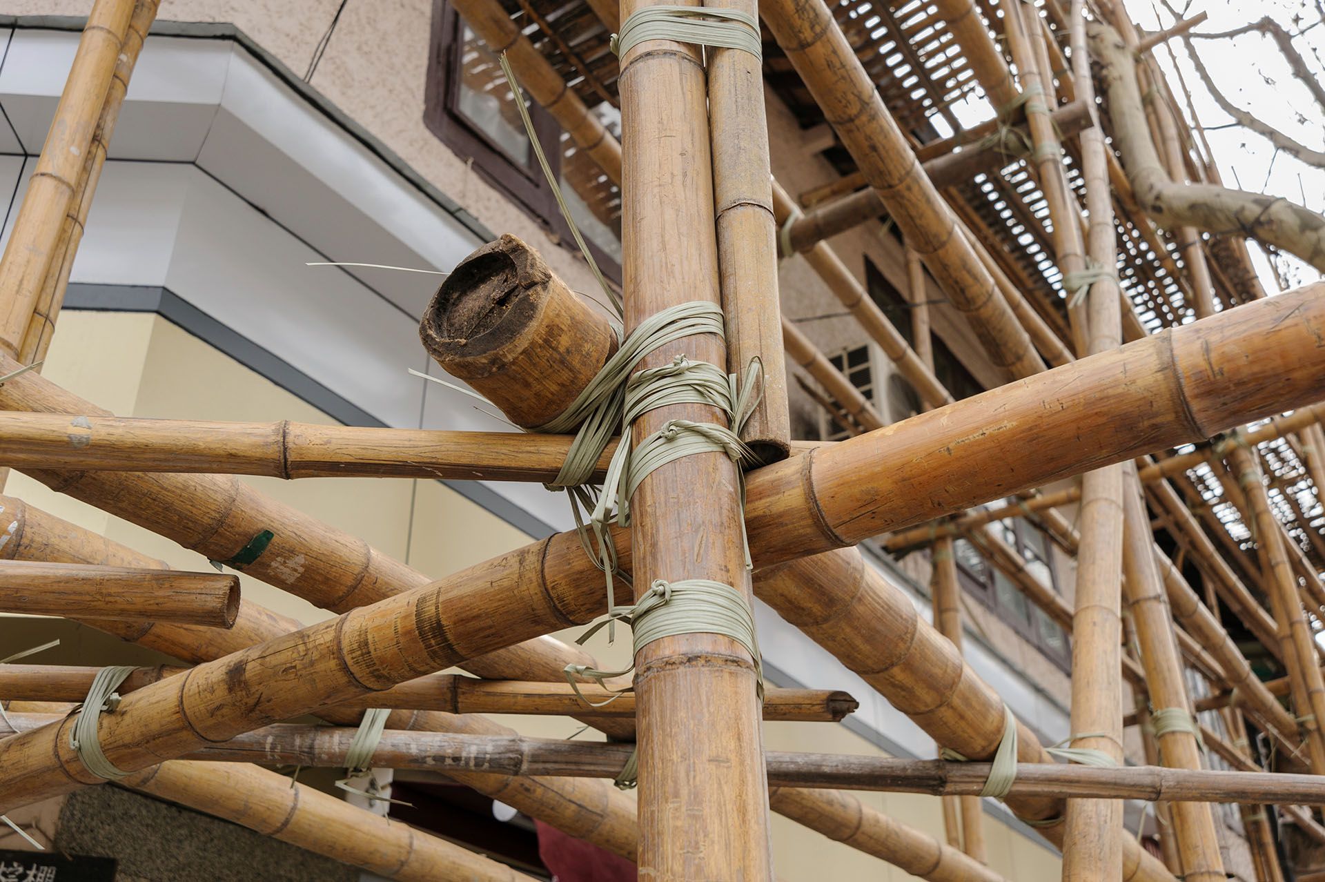 A large bamboo scaffolding on a building