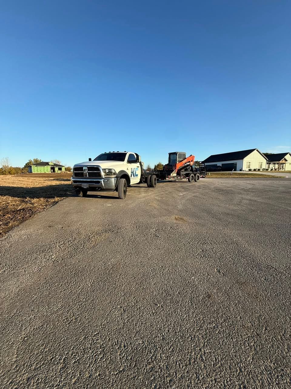 A man and a boy are standing next to each other on a wooden table.
