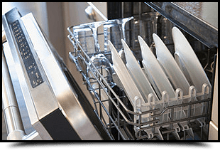 Loaded dishwasher with door open