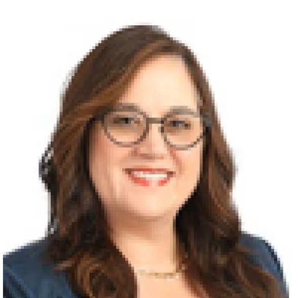 A professional headshot of a person with shoulder-length brown hair, wearing glasses and a dark blue blazer.