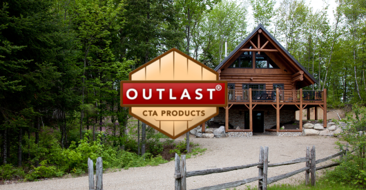 A log cabin in the middle of a forest with a outlast logo in the foreground.