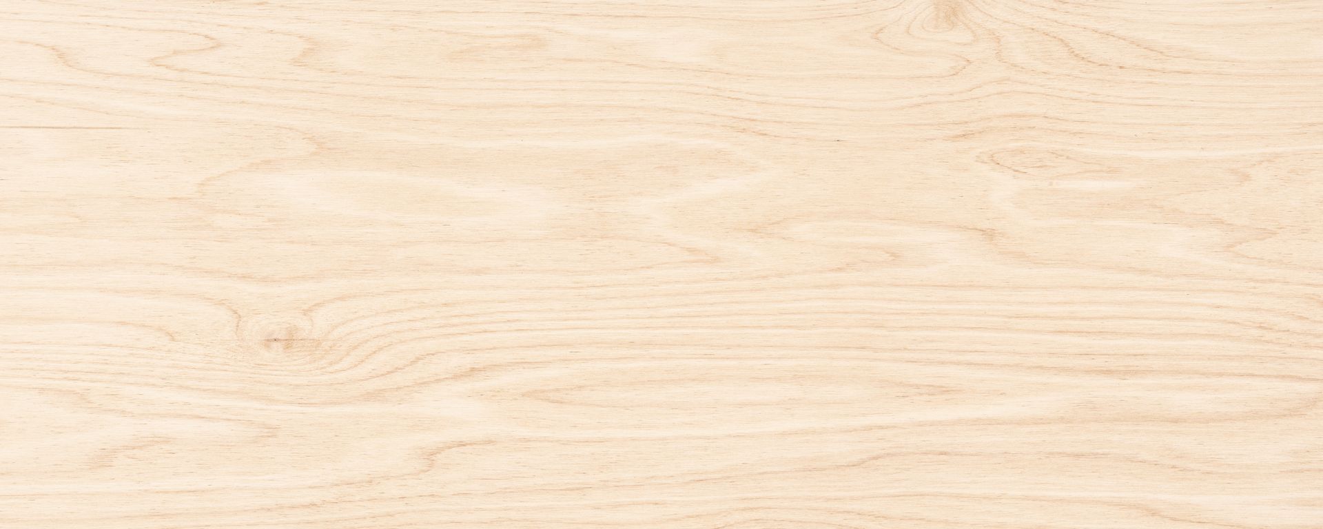 A close up of a piece of maple wood.