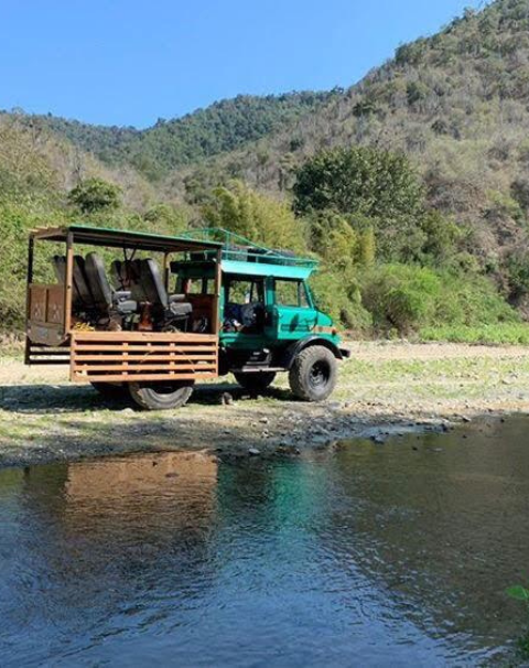 Unimog truck during a tour through the river of Olon, Santa Elena. In the coast of Ecuador