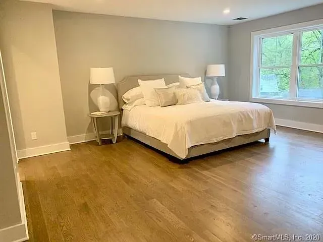 There is a large bed in the middle of the room.