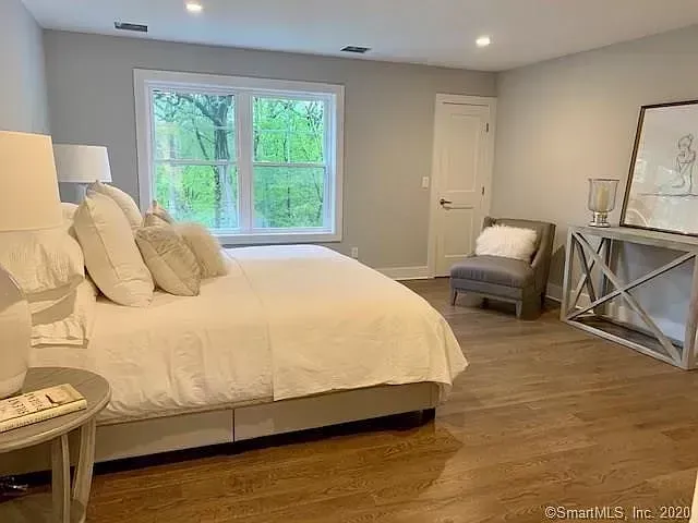 There is a large bed in the middle of the room.