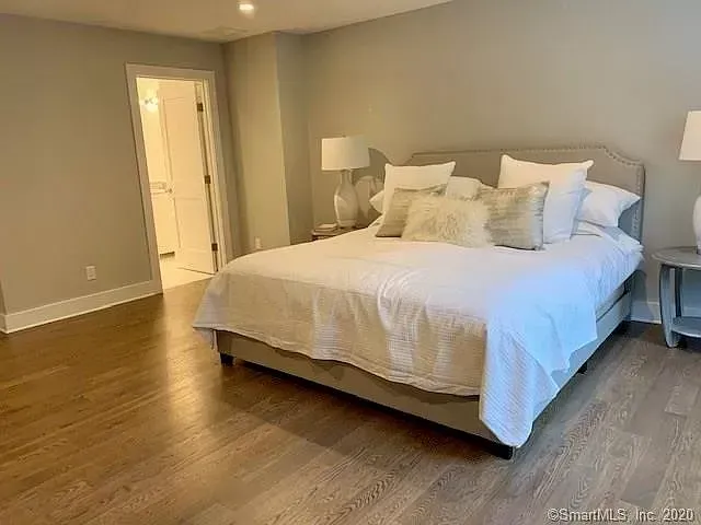 There is a large bed in the middle of the room.