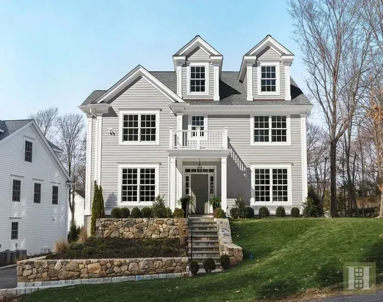 A large white house with a lot of windows