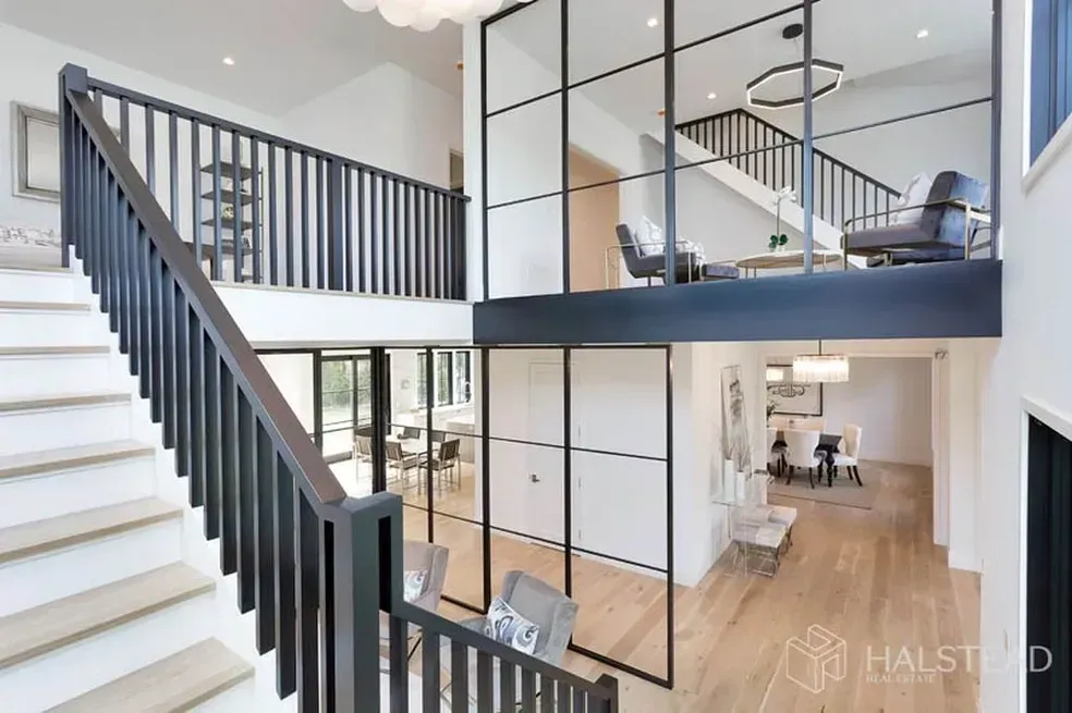 A staircase leading up to a second floor in a house.