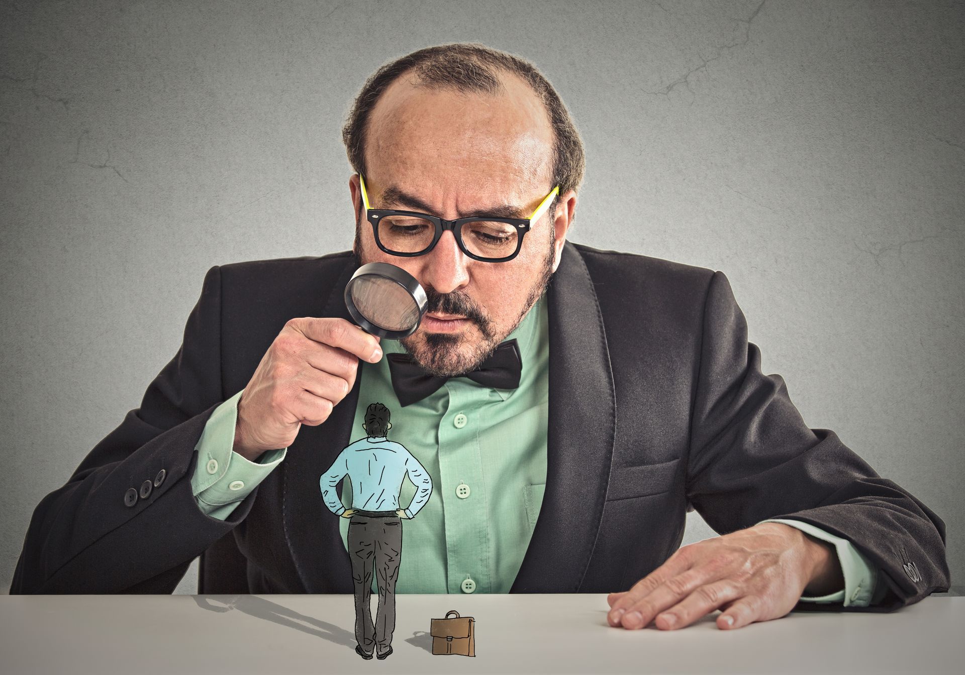 a man with a magnifying glass inspecting a criminal case during a background check