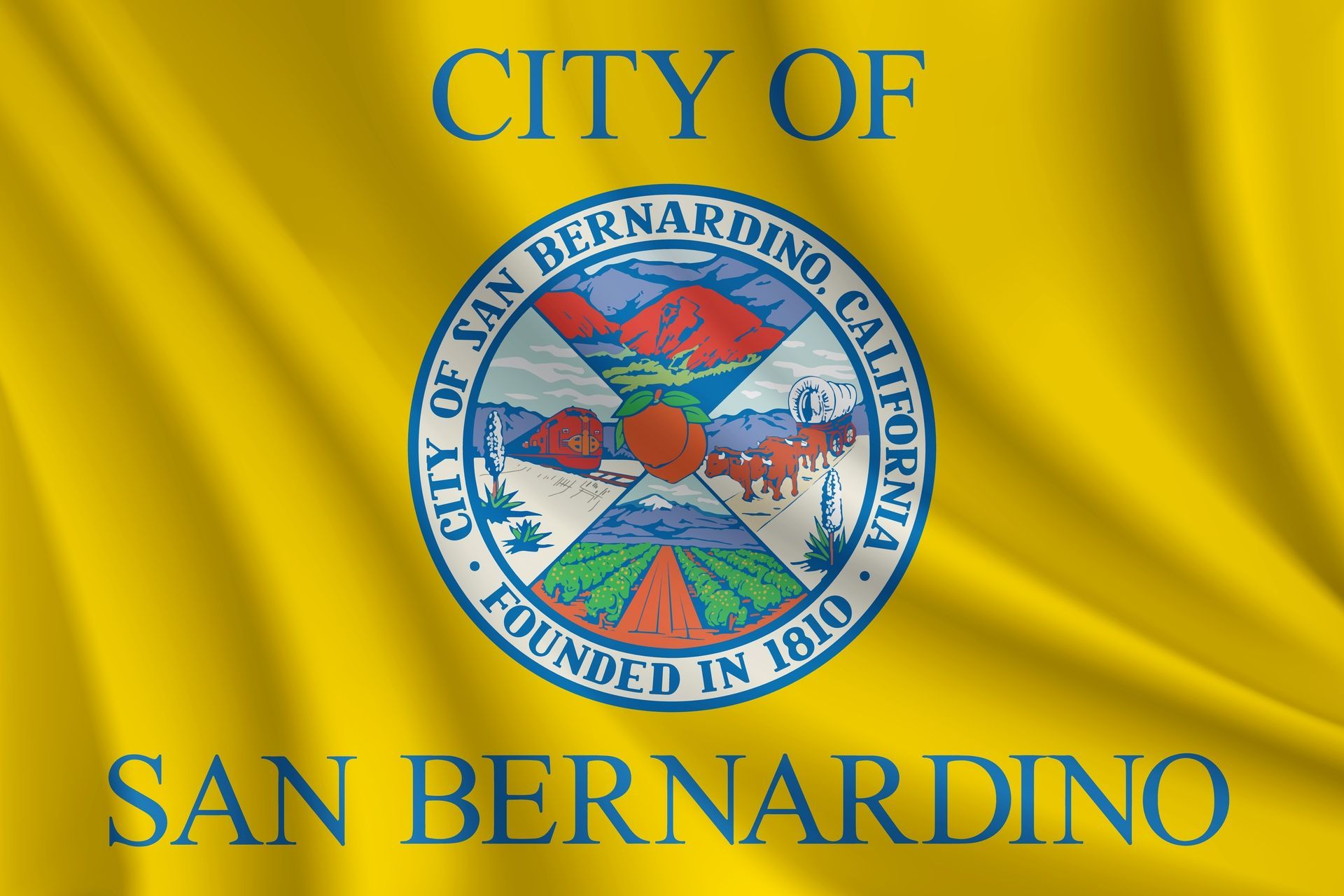 The flag of the city of san bernardino is waving in the wind. San Bernadino background screening data supplier.