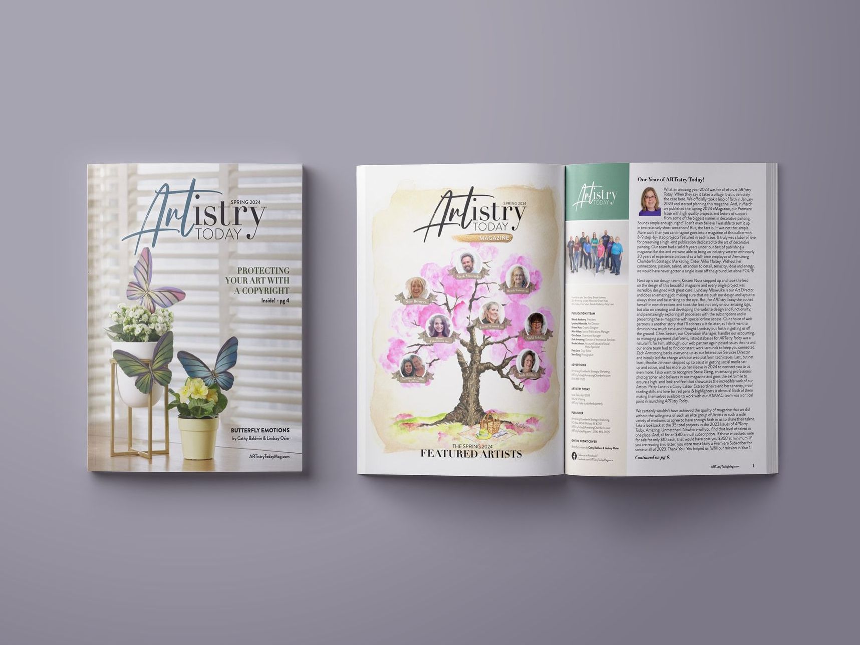 A magazine is open to a page with a tree on it.