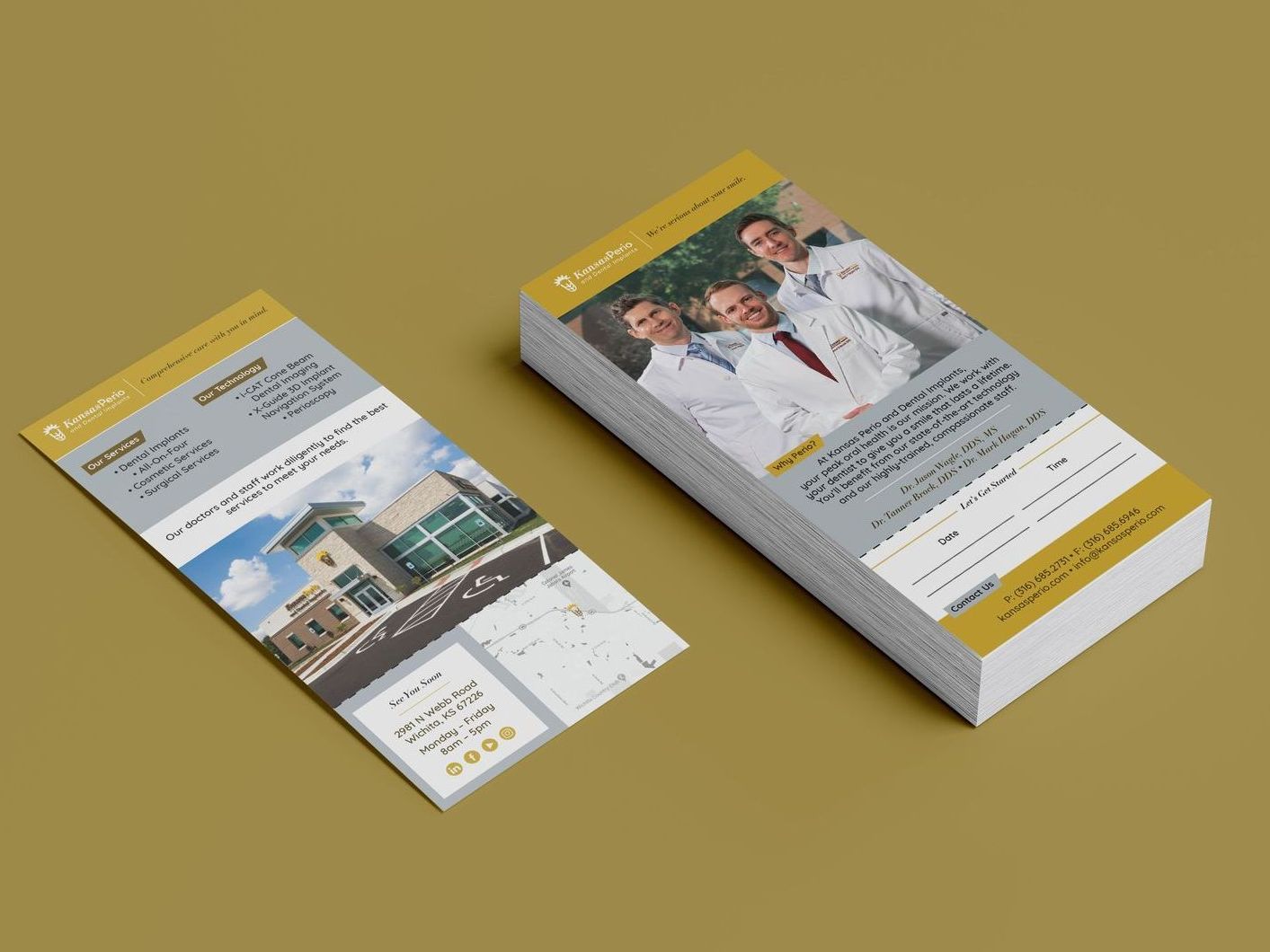 Two brochures are stacked on top of each other on a table.