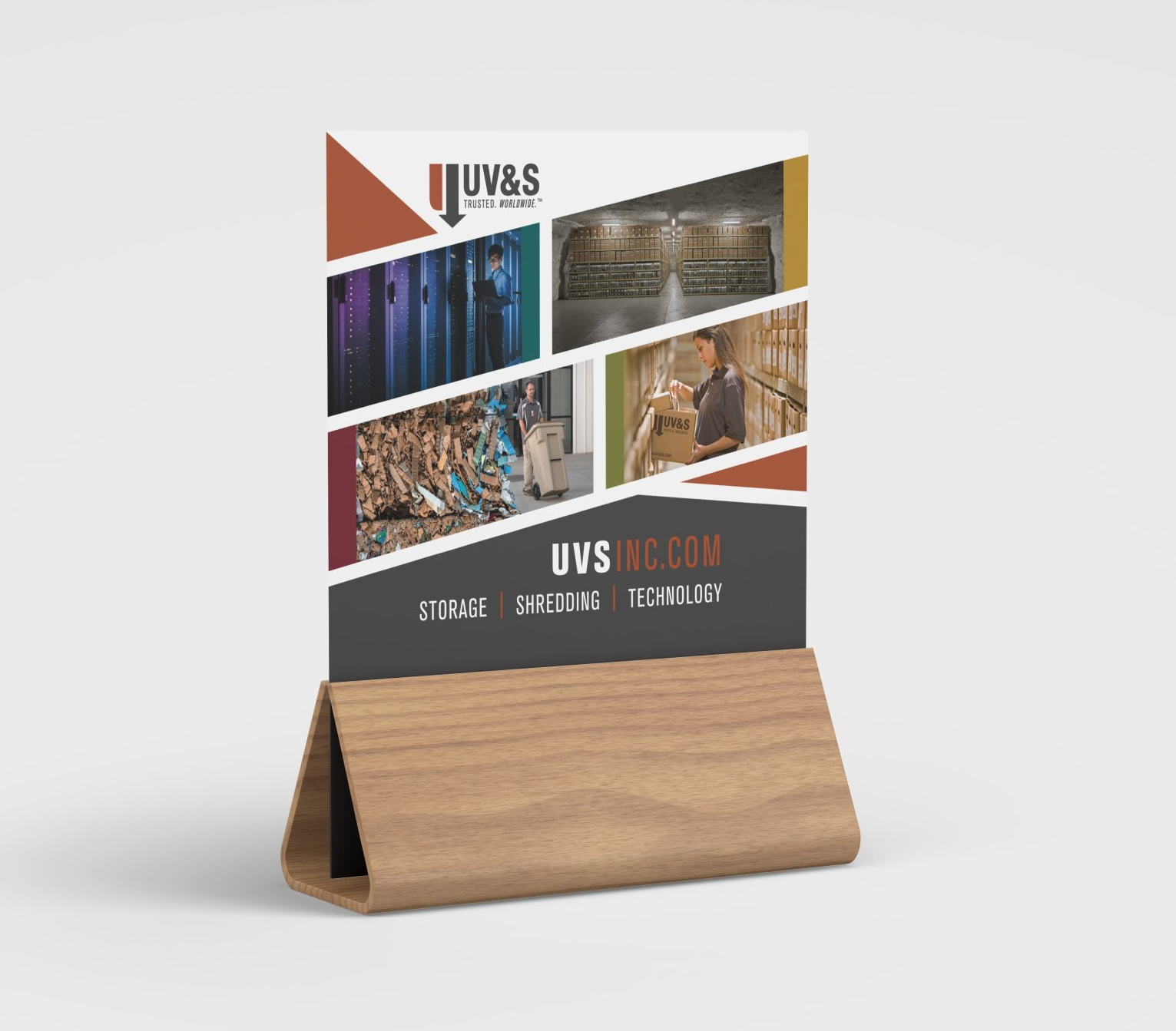 A brochure is sitting on top of a wooden stand.