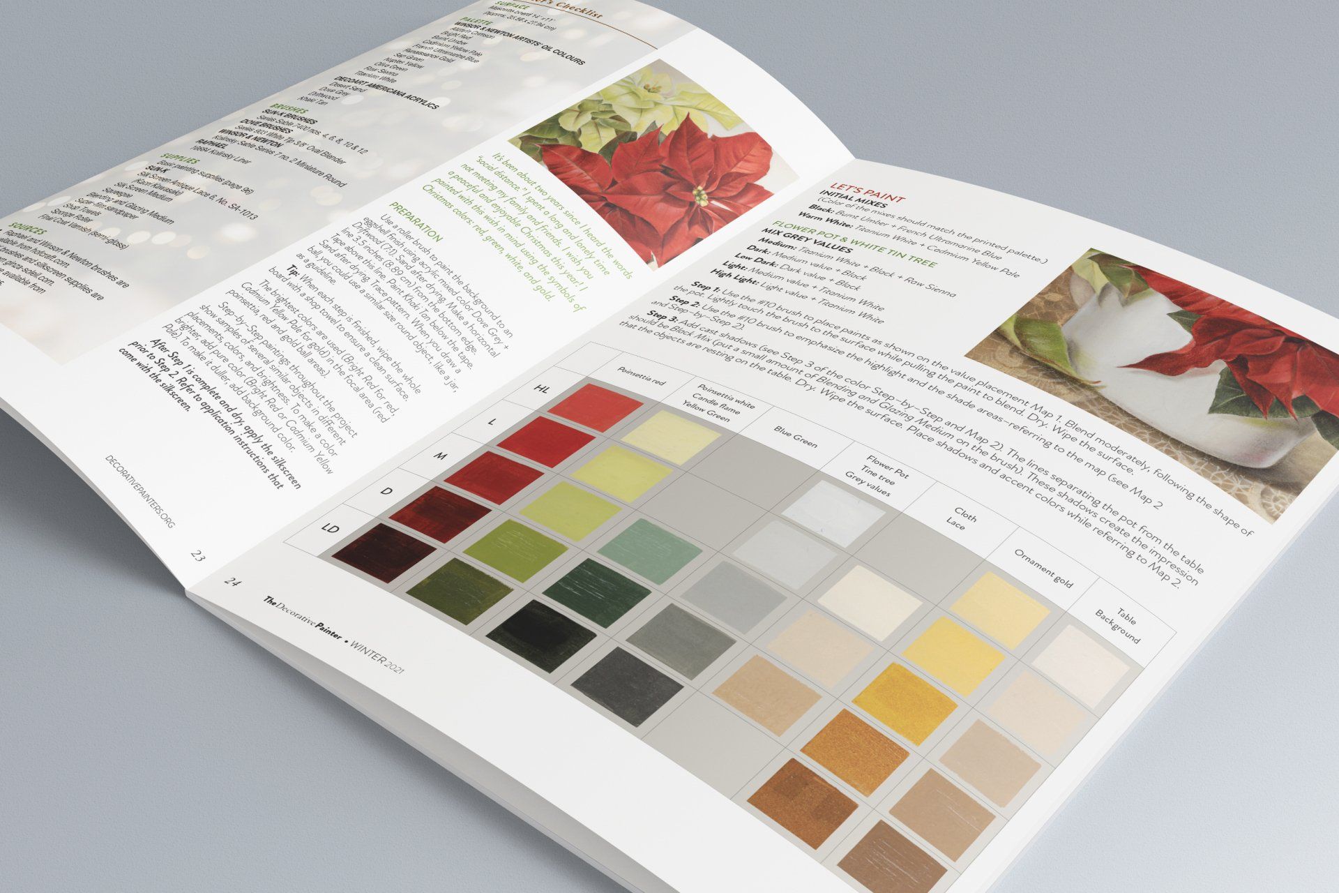 A book is open to a page with a picture of a poinsettia on it.