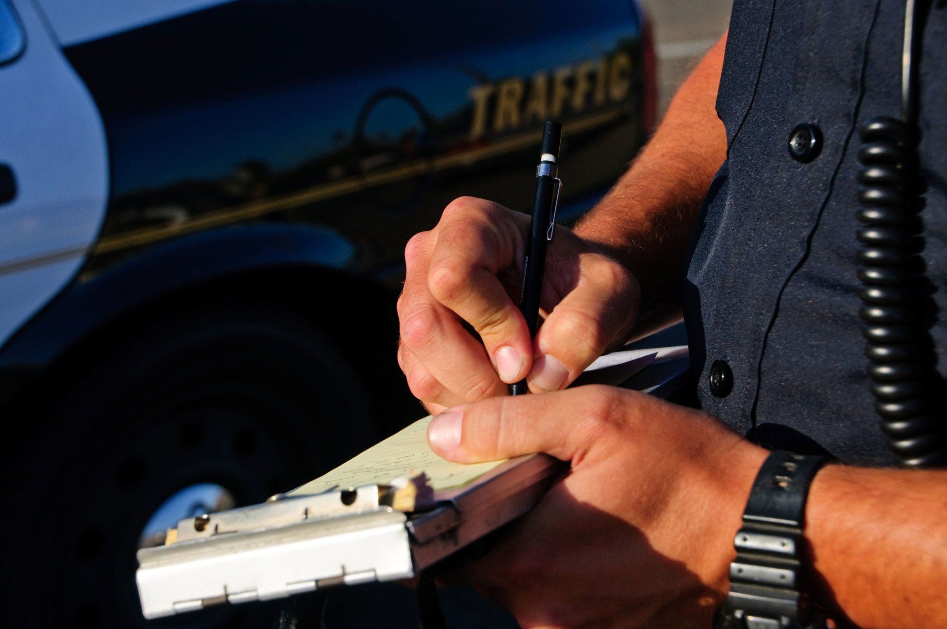 Traffic Tickets - A Police Officer Writing A Ticket in Belvidere, NJ