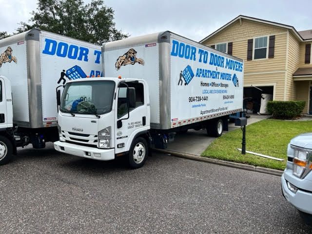 Truck parked outside the house - Door To Door Movers & Apartment Movers