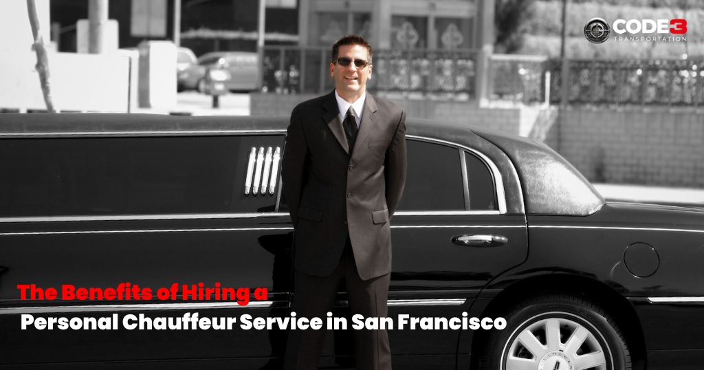 A man in a suit and tie is standing in front of a black limousine.