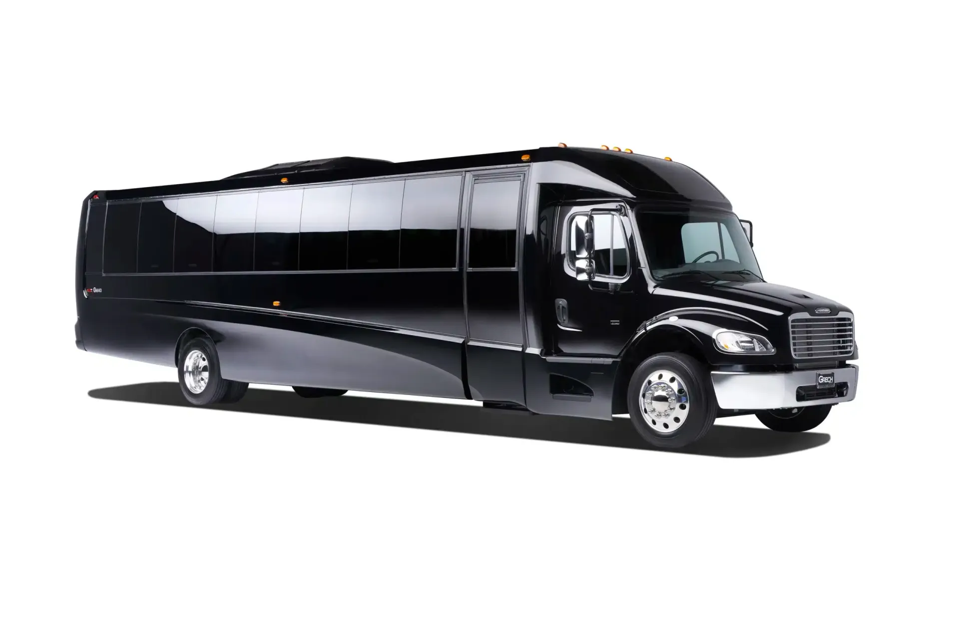 A black limousine is parked on a white background.
