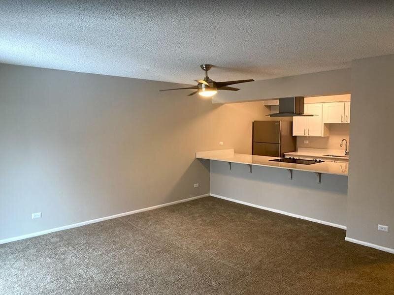 Living Room | Falcon Run Apartments in Englewood, CO