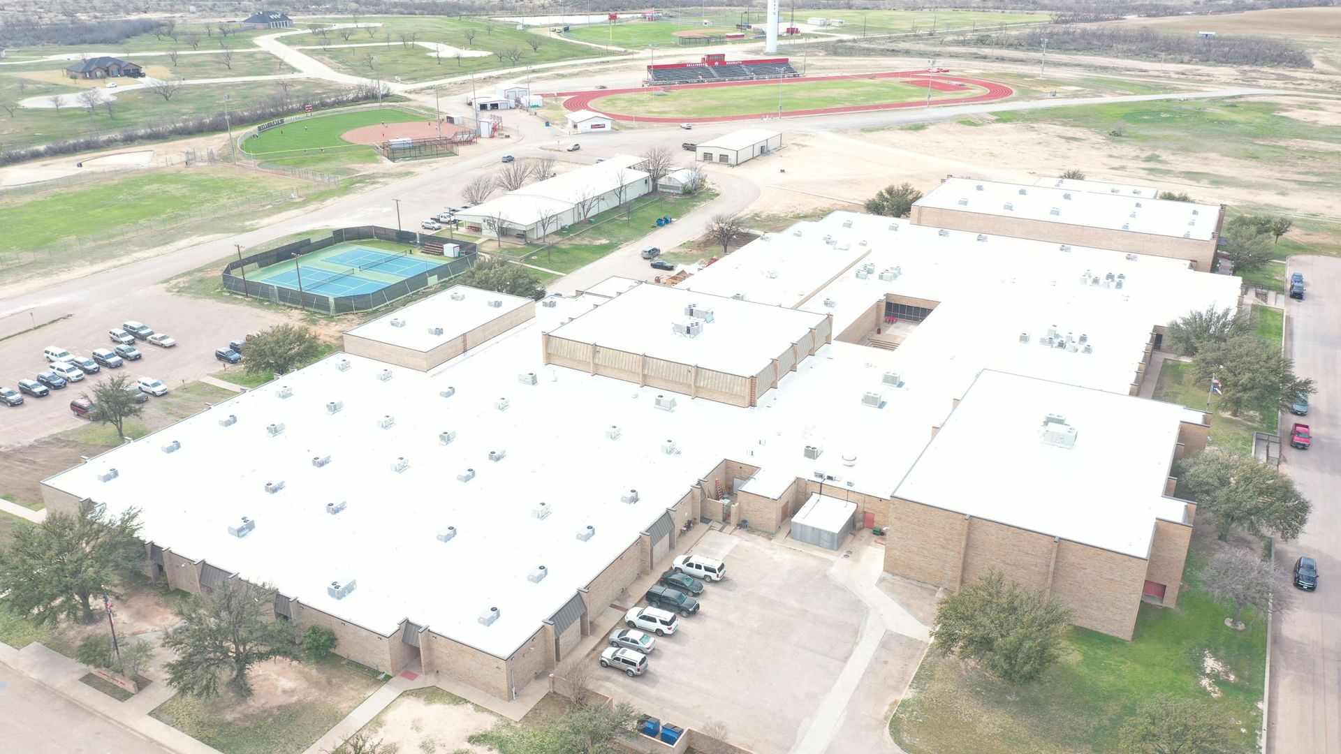 A bulldozer is being used to demolish a building.