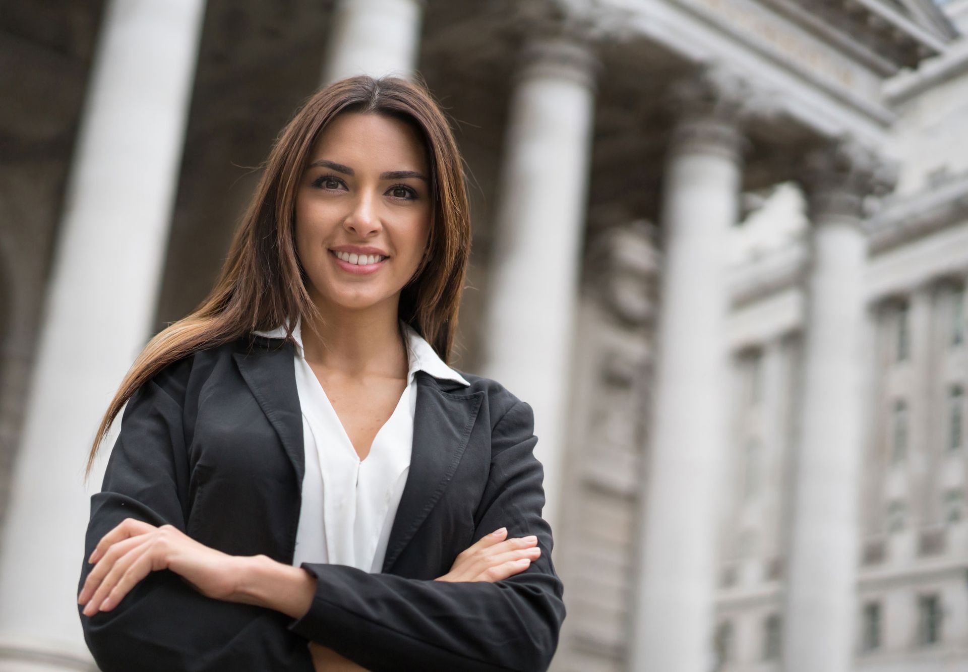 A Woman With A Town Hall Background — The Law Offices Of Cardaro & Peek, LLC